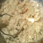 mixing up spicy crab ingredients